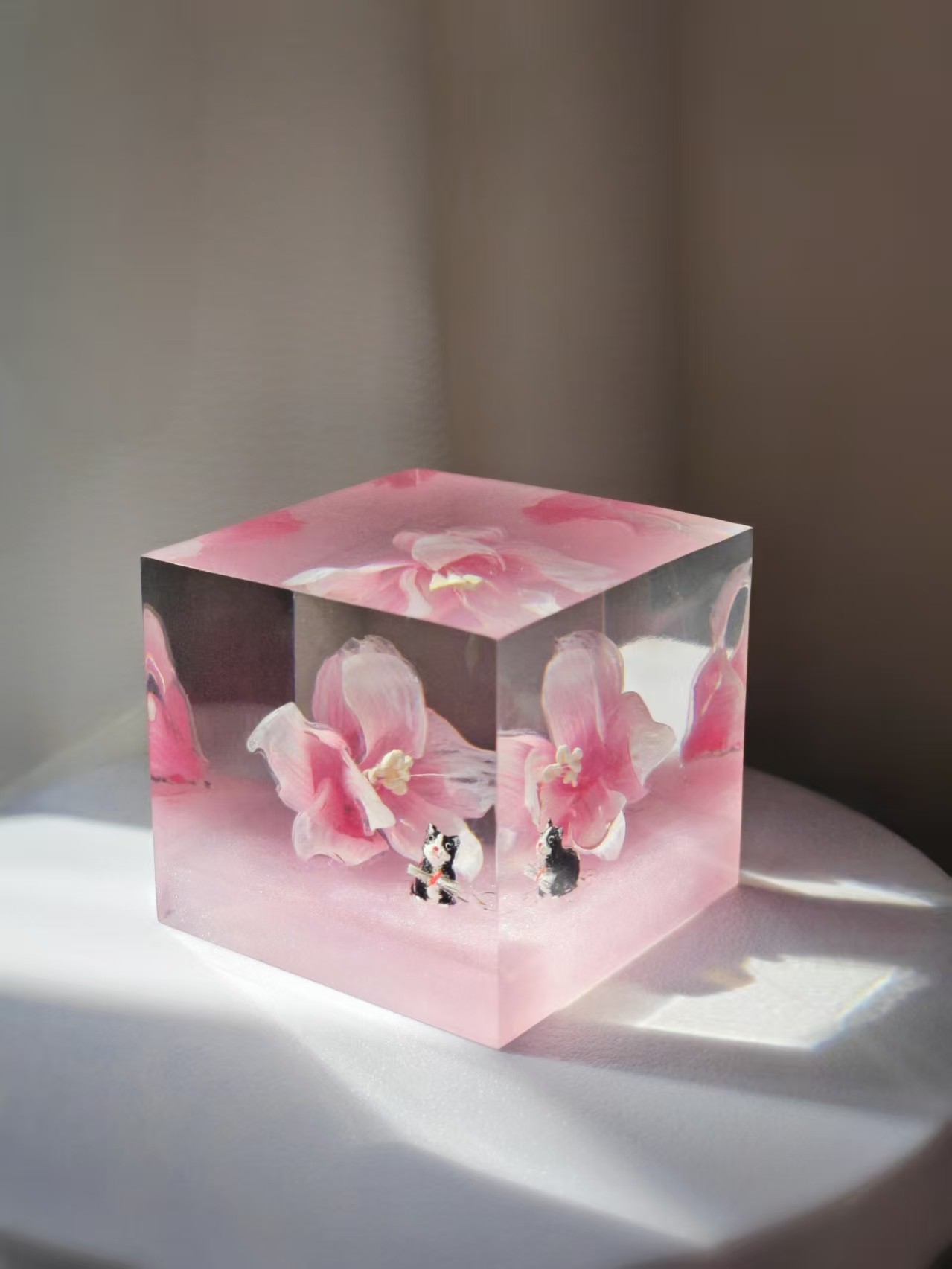 Pet keepsakes section cover with a cat silhouette and pressed flowers