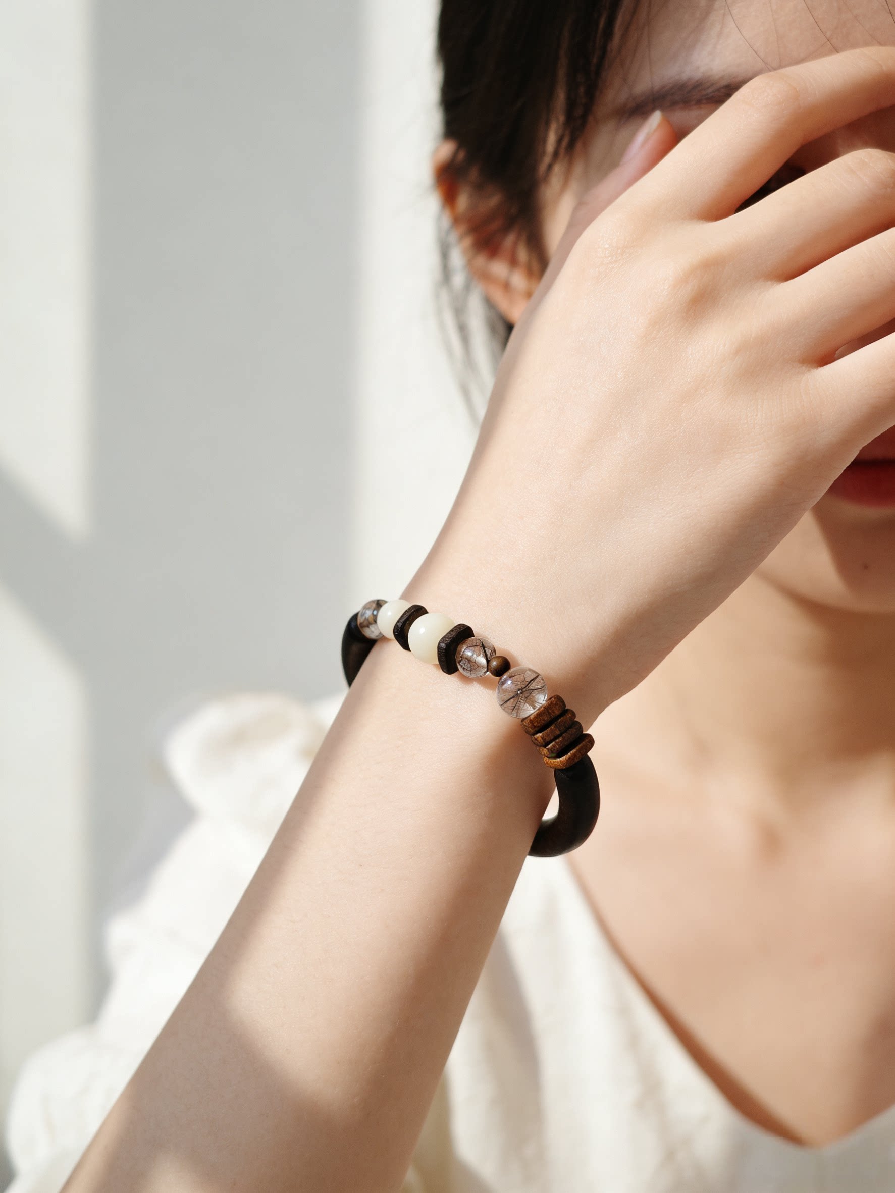 Ebony wood bead bracelet with a single memory keepsake bead