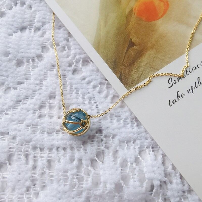 Fine pendant necklace with a small keepsake window