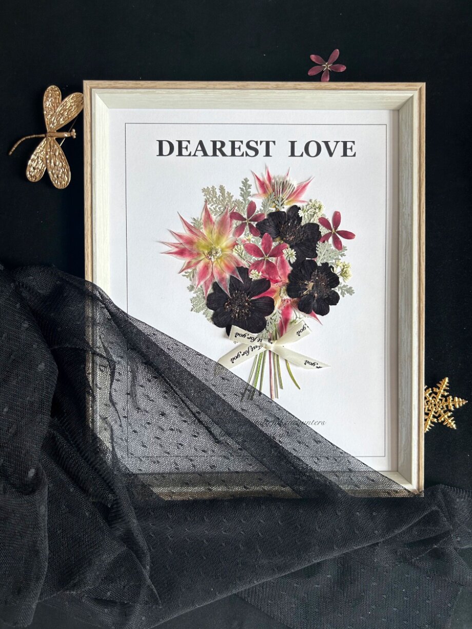 Sealed botanical specimen art with pressed leaves and stems