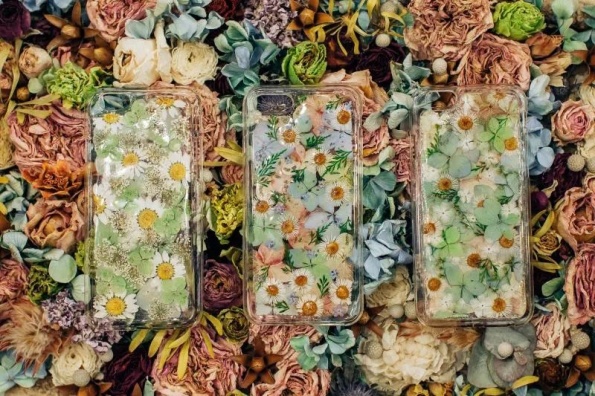 Transparent phone cases made with pressed flowers